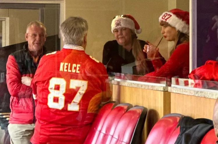 Travis Kelce's Dad discussing with Taylor Swift's Parent