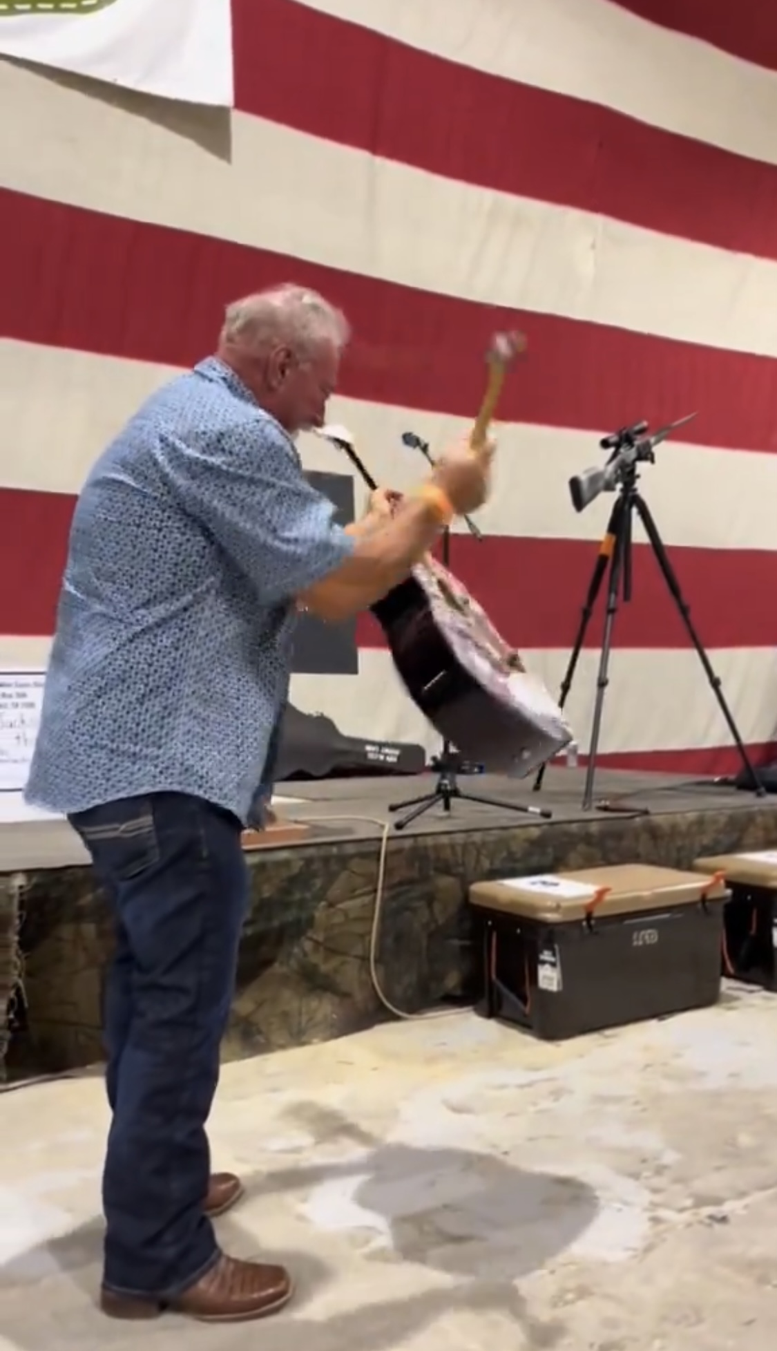 Guy bought a signed Taylor Swift guitar at a live auction for $4,000, only to destroy it