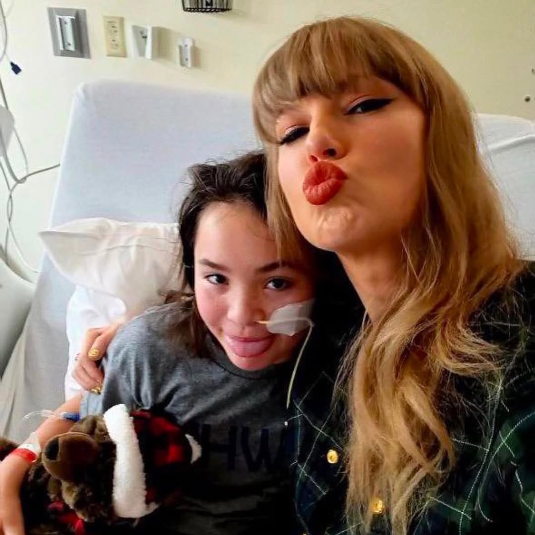 Taylor Swift spent her last day as a 34-year-old giving back to fans in Kansas City, stopping by a hospital and visiting with young patients on Thursday