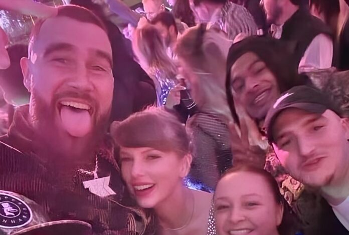 Taylor Swift and Travis Kelce with some fans during a NYE party