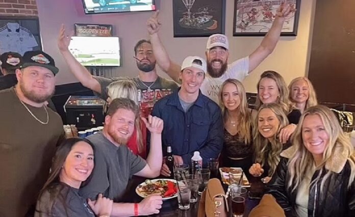 Travis Kelce with Brittany Mahomes and Group