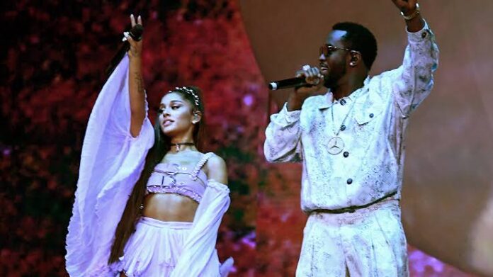 Diddy and Ariana Grande performing