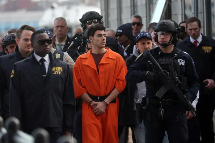 Luigi Mangione Escorted to court with a squad of NYPD