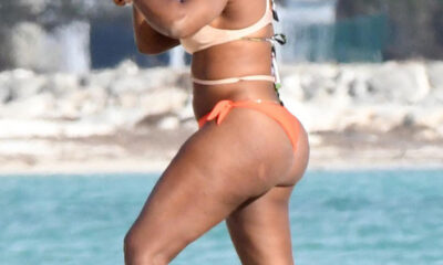 Serena Williams displays voluptuous derriere as she strips down to sexy mismatched bikini...