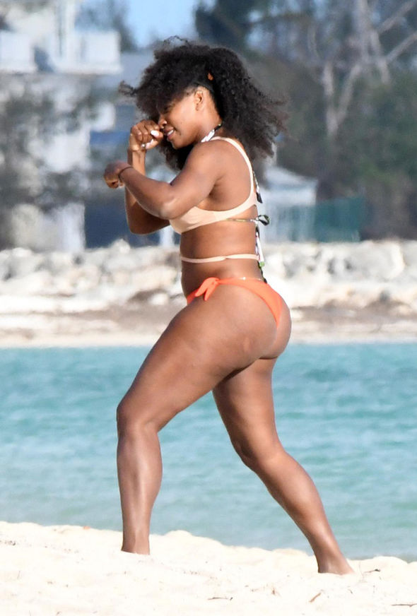 Serena Williams displays voluptuous derriere as she strips down to sexy mismatched bikini...