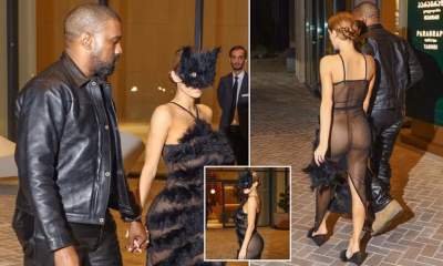 Naughty kitty! Kanye’s wife Bianca Censori is bra and underwear free in a VERY sheer gown with a CAT mask