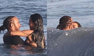 Kim Kardashian and Lewis Hamilton were spotted sharing a passionate kiss in the ocean during a romantic surf date in Malibu...