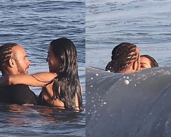 Kim Kardashian and Lewis Hamilton were spotted sharing a passionate kiss in the ocean during a romantic surf date in Malibu...