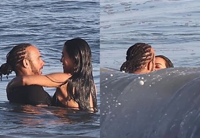 Kim Kardashian and Lewis Hamilton were spotted sharing a passionate kiss in the ocean during a romantic surf date in Malibu...