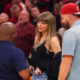 Travis Kelce brought his fiancé Taylor Swift to game three of the Eastern Conference Finals between the Cavaliers and Knicks — Taylor stopped on her way out to pose with a young fan...